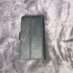 I’m selling a Michael Kors phone case wallet